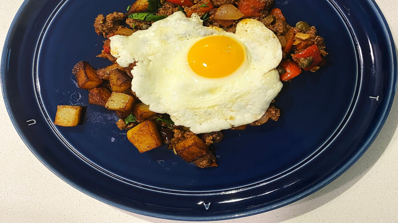 Picadillo Cubano served with a sunny side up egg