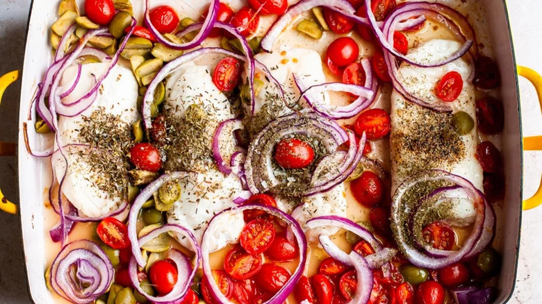 cod filets with veggies in pan