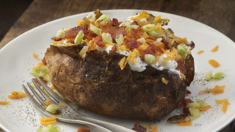 Baked potato on plate