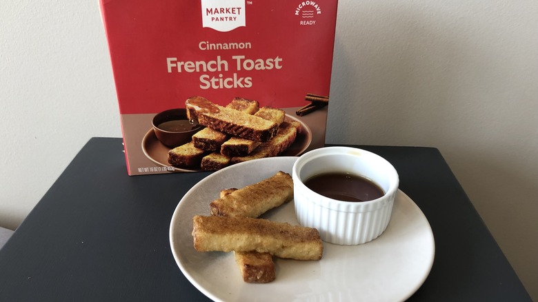 Plate of Market Pantry French toast sticks and syrup.