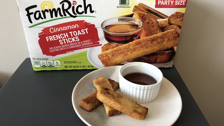 Plate of Farm Rich French toast sticks and syrup.