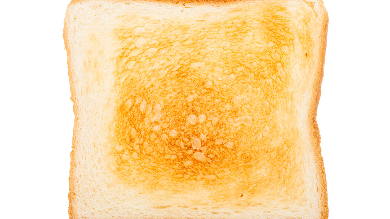 Toasted open-faced bread slice