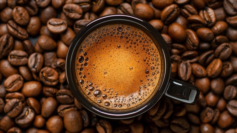 Coffee cup with beans