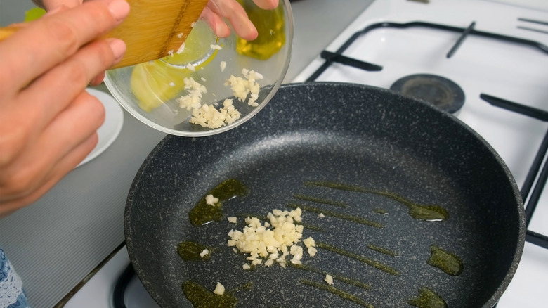 cooking garlic in pan