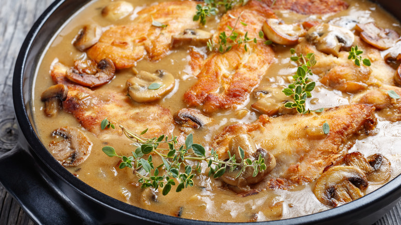 marsala sauce in pan with chicken