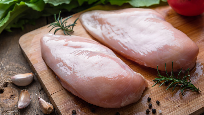 boneless, skinless chicken breasts on board