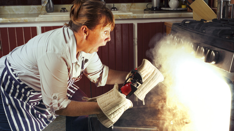 putting out an oven fire