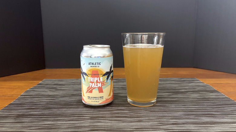 Athletic triple palm IPA in a pint glass on a bar mat