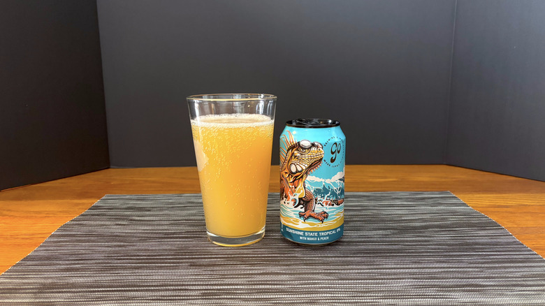 Go Brewing Sunshine State tropical IPA in pint glass on bar mat