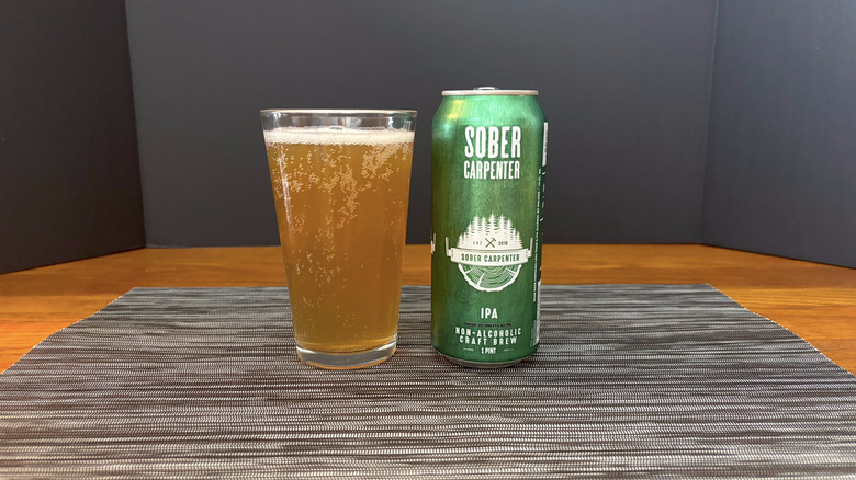 Sober Carpenter DDH hazy IPA in pint glass on bar mat