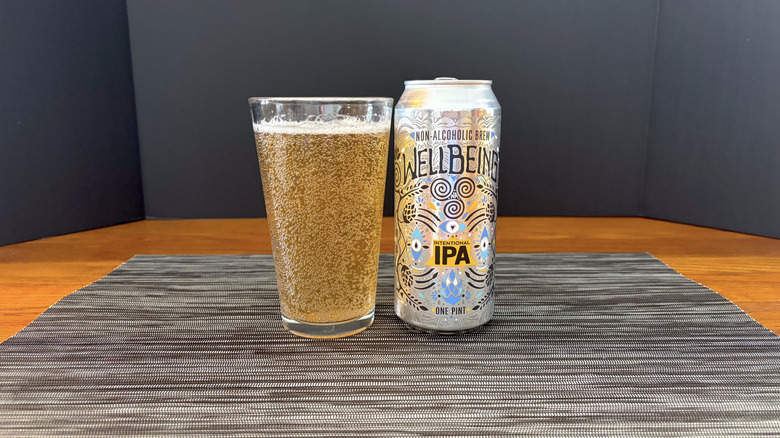 WellBeing Intentional IPA in pint glass on bar mat