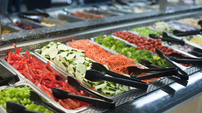 Salad bar with tongs