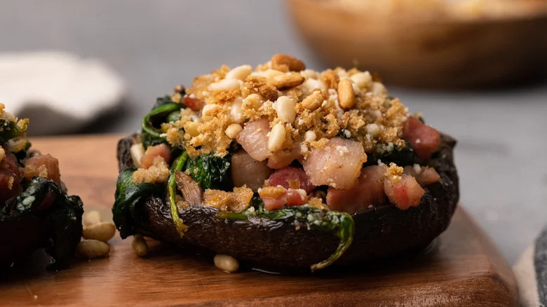 Stuffed mushrooms on cutting board