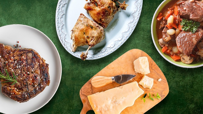 A collection of food on a green background