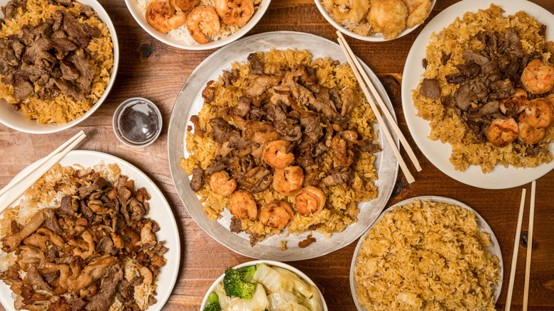 Variety of hibachi dishes on table from above