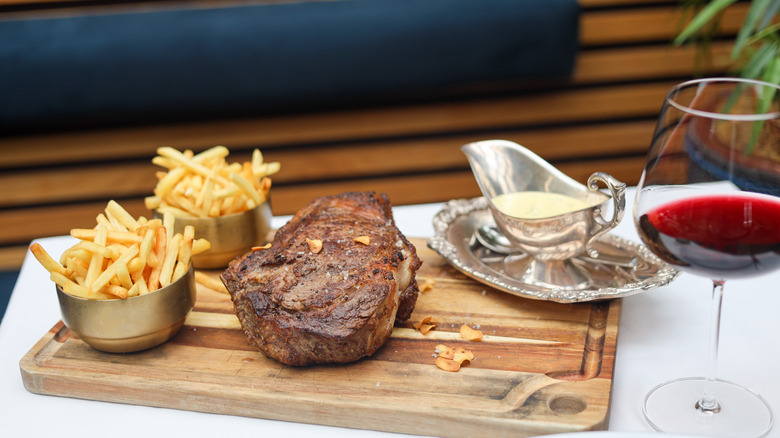 steak frites with bernaise sauce on the side