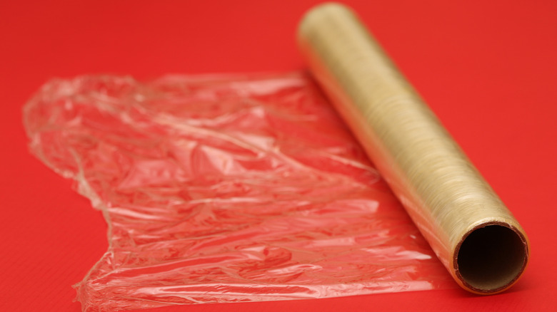 Cling film on red background