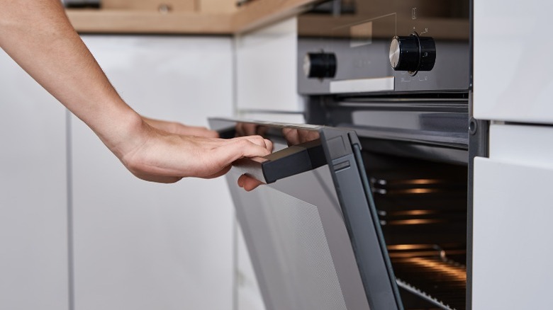 Opening an oven door