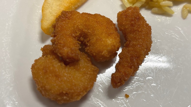 Golden Corral fried shrimp on white plate