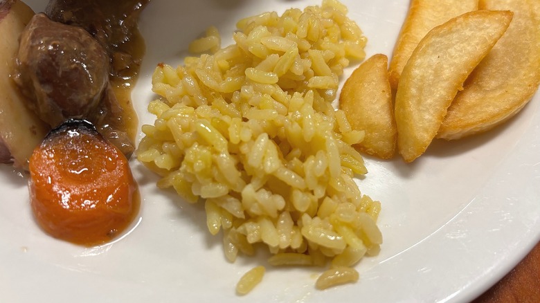 Golden Corral yellow rice on white plate