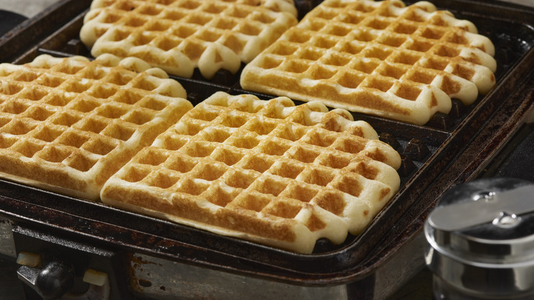 Four waffles in waffle iron