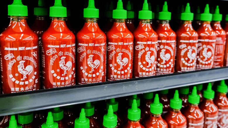 Sriracha hot sauce on shelves