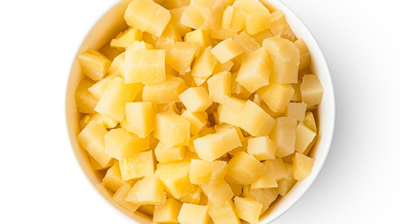 Boiled diced potatoes in bowl