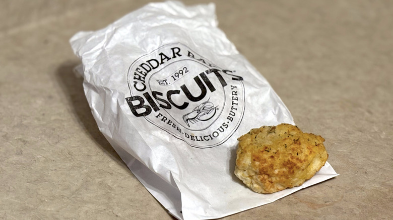 Red Lobster cheddar bay biscuit on foiled bag on neutral counter top