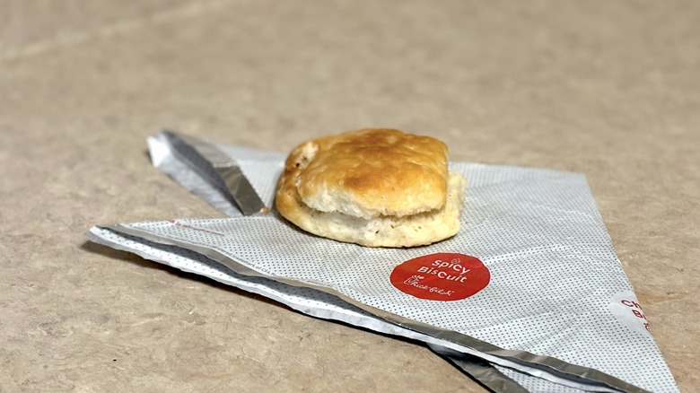 Chick-fil-A biscuit on wrapper on neutral counter top