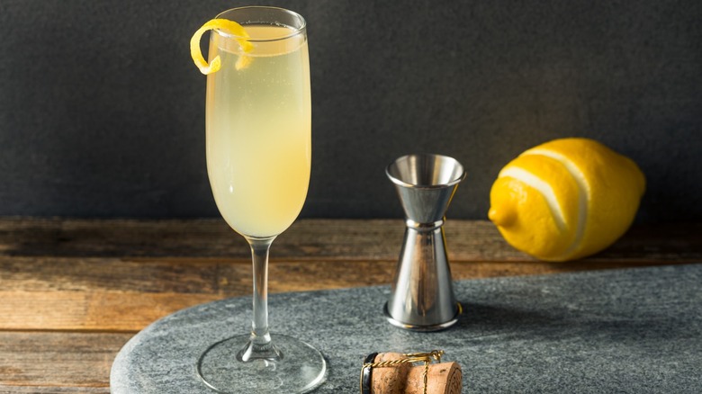 French 77 with a peeled lemon