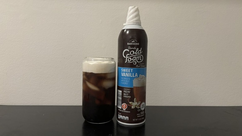 barissimo cold foam can next to iced coffee cup