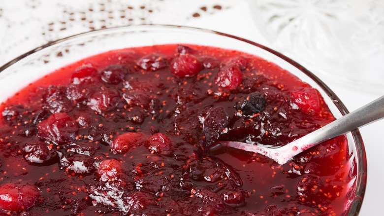 cranberry sauce with serving spoon