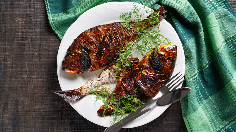 whole mahi mahi on plate