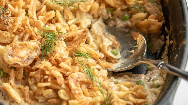 Dish of tuna casserole with spoon