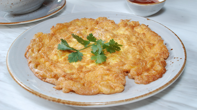 Kai jiao with parsley garnish