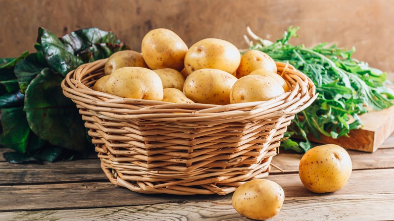 woven basket filled with white potatoes