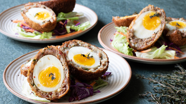 scotch eggs on plates