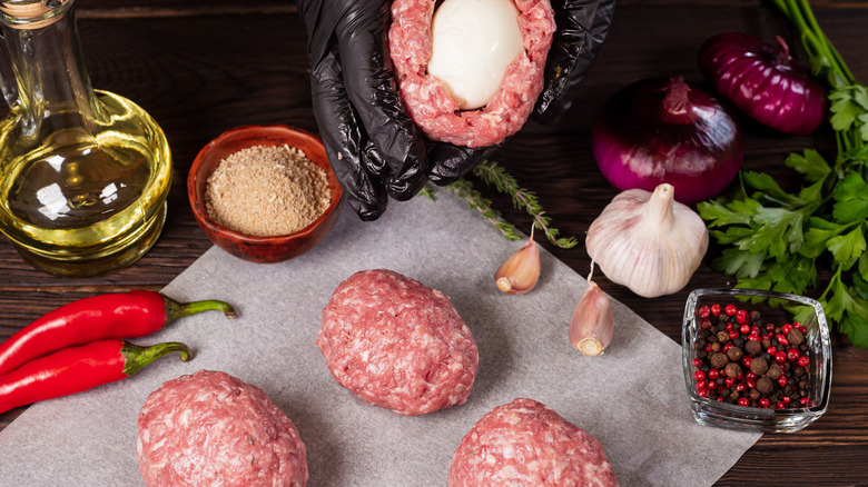 Scotch eggs being made