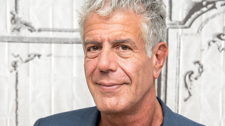 Anthony Bourdain looking at camera smiling