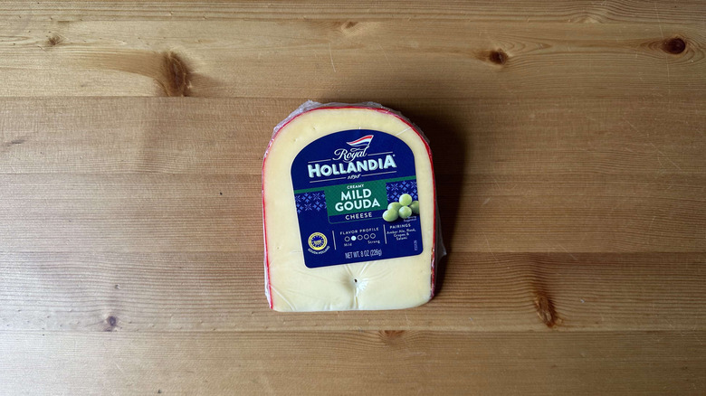 Royal Hollandia creamy gouda on wooden table