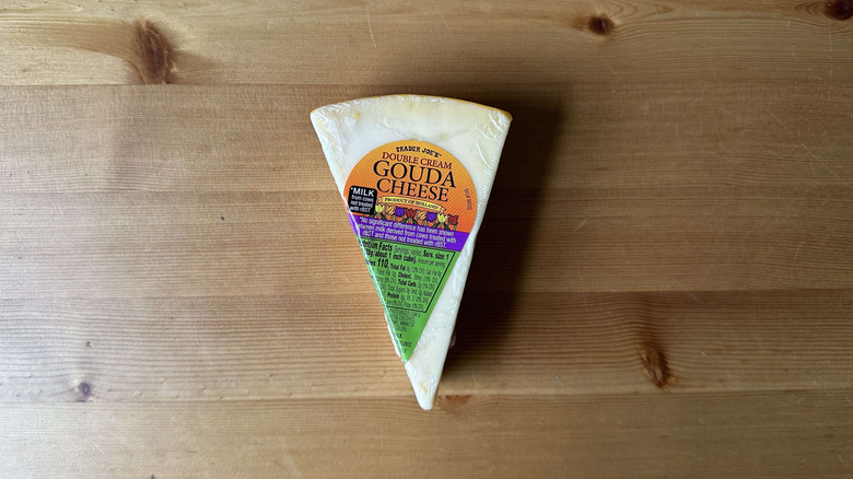 Trader Joe's Double Cream Gouda cheese on wooden table