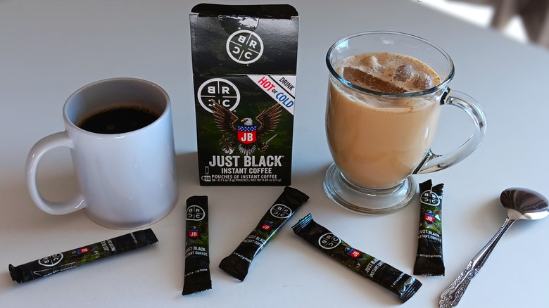 Black Rifle Coffee Company instant coffee packets and two mugs of coffee