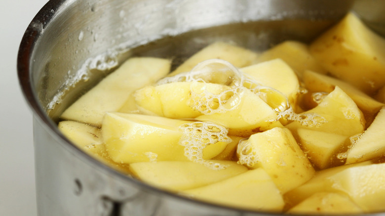 Potatoes boiling in water