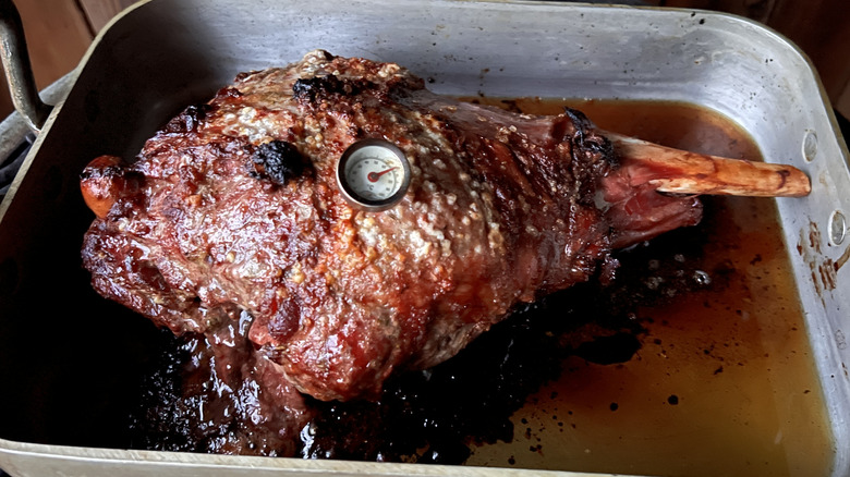 leg of lamb in roasting pan