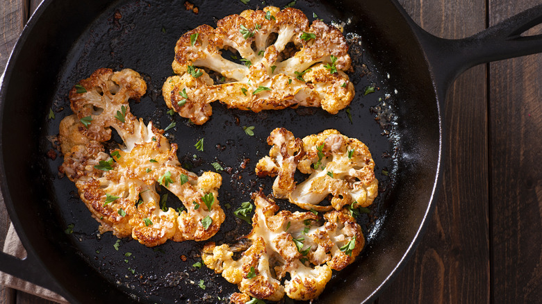 cauliflower steaks in skillet