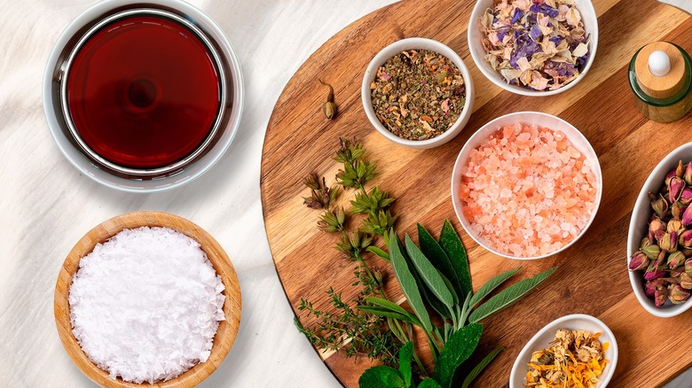 various salts and ingredients for infusing on wooden surfaces