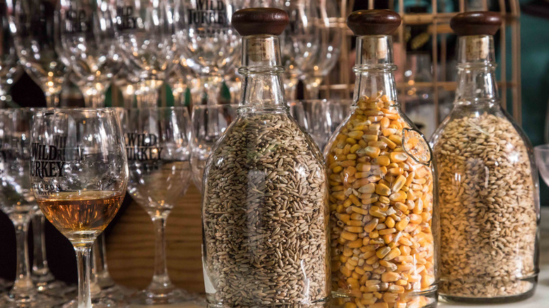 Bottles of grain and bourbon glass