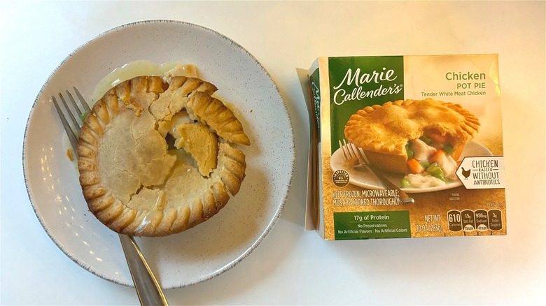 Marie Callender chicken pot pie on plate next to box