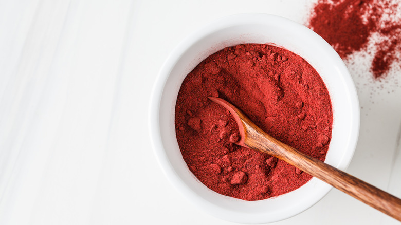 Bowl beet powder in white bowl