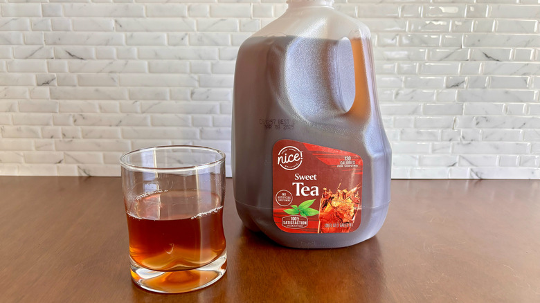 Glass of sweet tea with Nice! sweet tea gallon